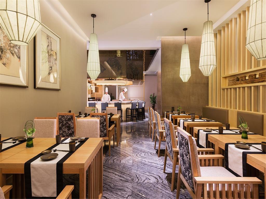 Wanda Realm Fushun Hotel Fushun  Bagian luar foto